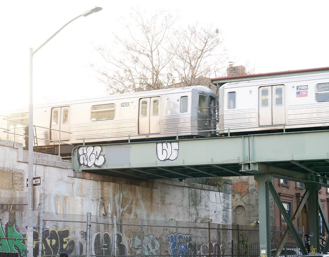 Subway train going across the bridge in the city
